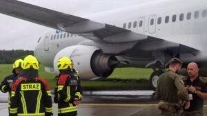 krakow airport shutdown: boeing 737 overruns runway in heavy rain